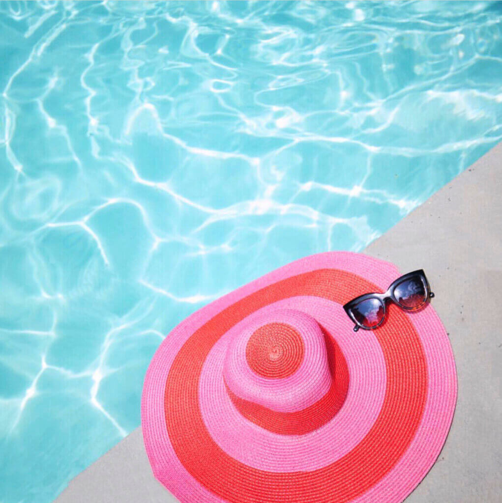 Chic summer accessories styled for a poolside celebration
