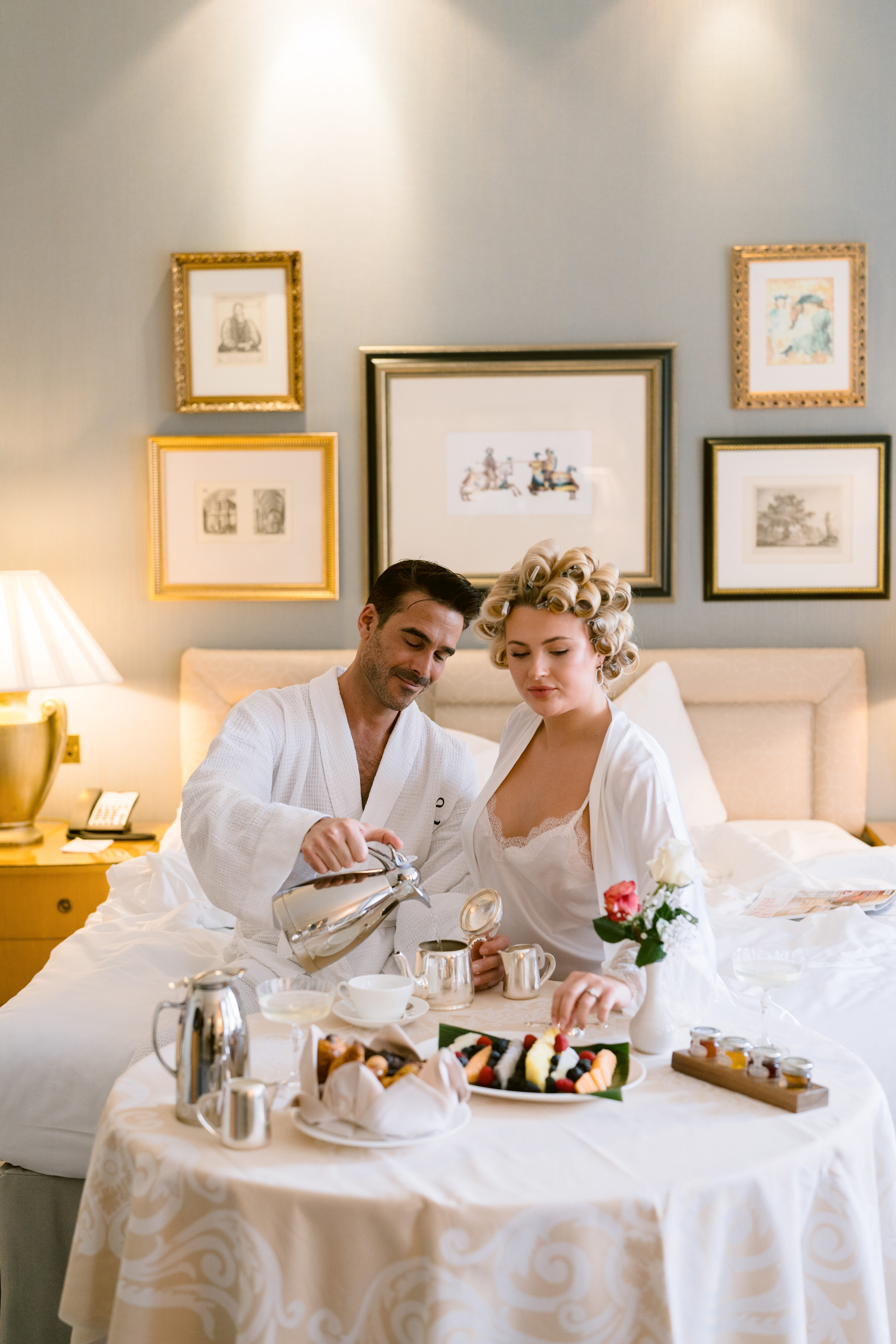 bride and groom having oom service breakfast