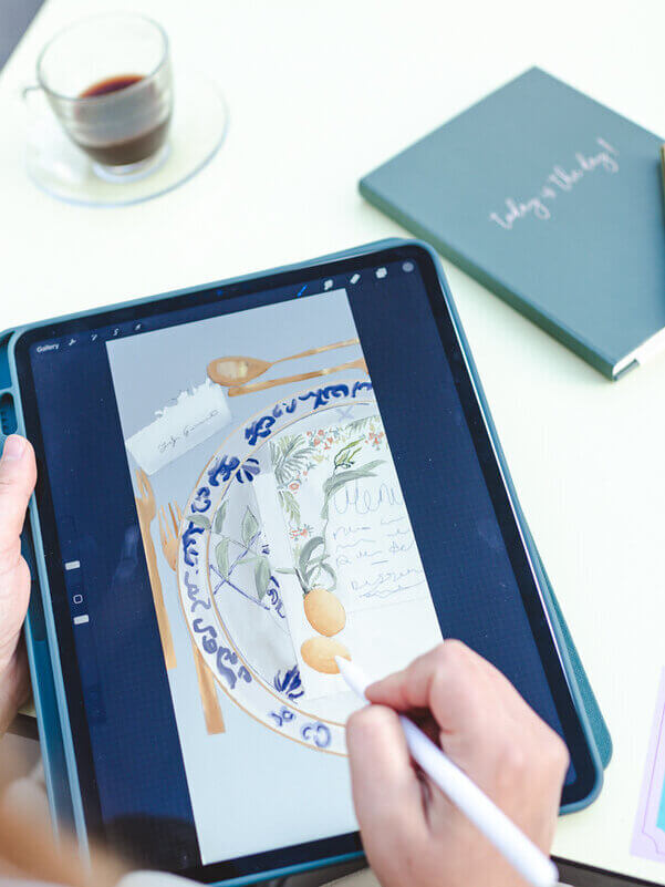 design-led wedding planner sketching on Ipad