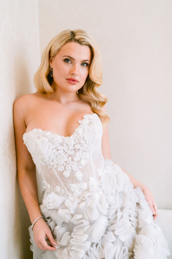 Luxury London wedding inspired by Old Hollywood glamour with vintage waves framed by delicate light from the window