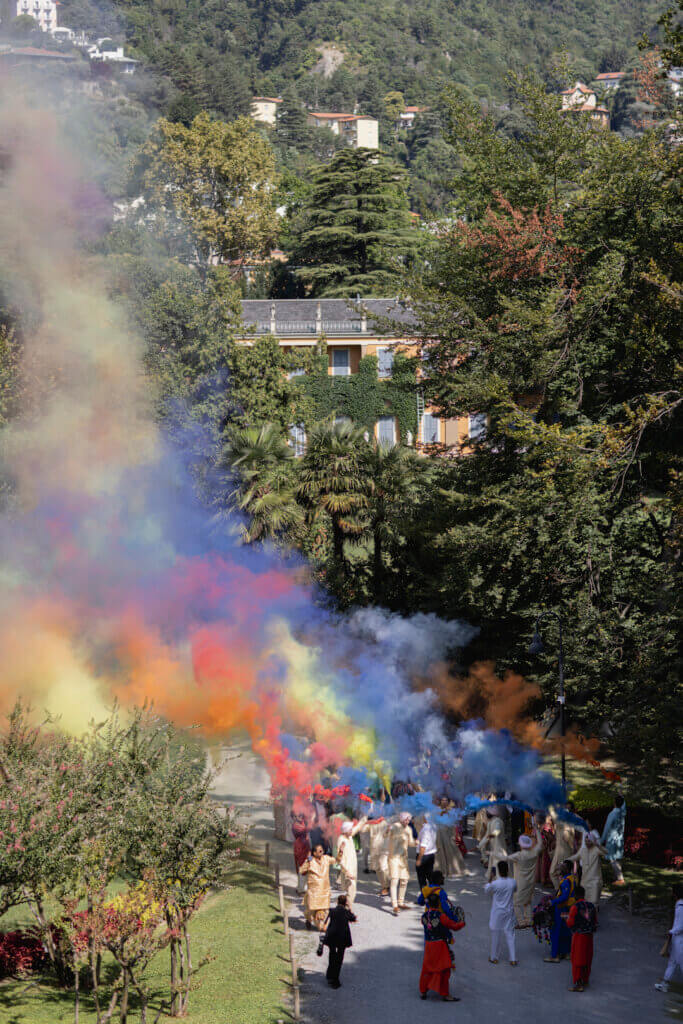 Vibrant baraat during luxury Indian wedding in Lake Como planned by Roberta Burcheri Events