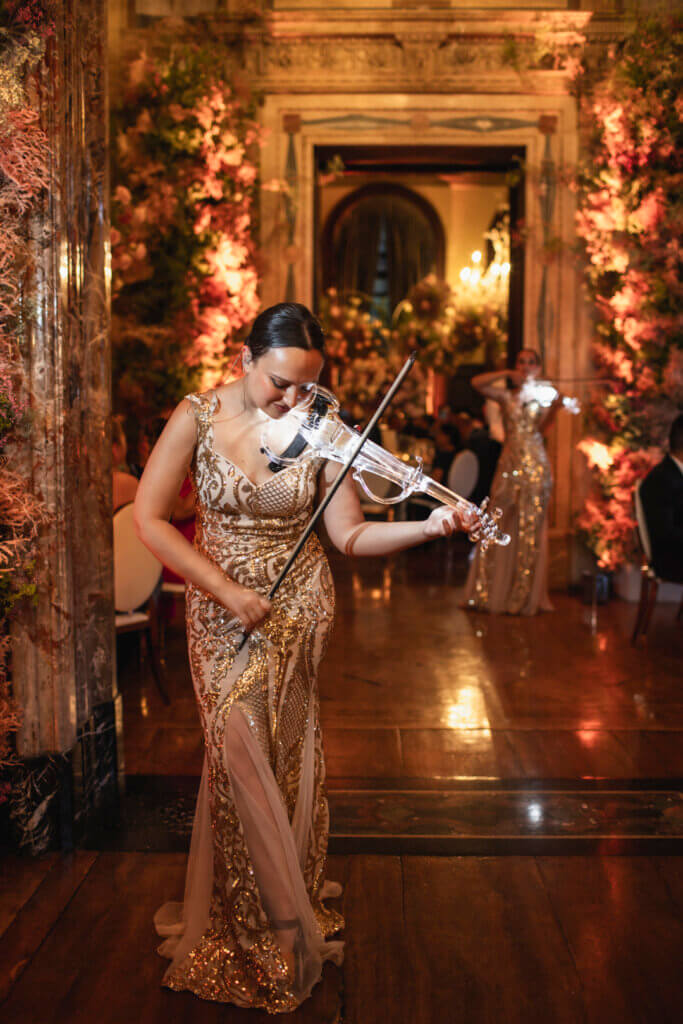 grand Insian wedding entertainment violinist during dinner reception